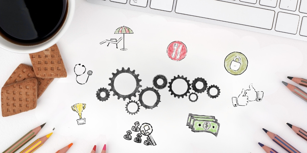 Sketches representing various types of employee benefits such as pay, vacation, and medical insurance on a desktop in front of a keyboard